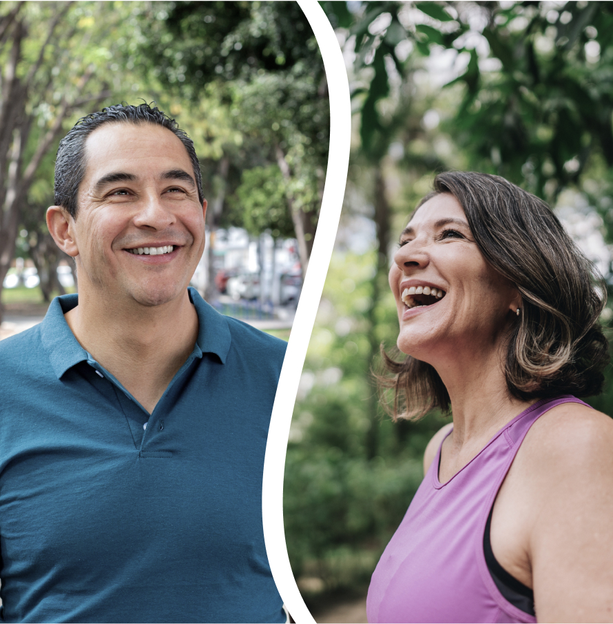 A man and woman smiling outdoors after seeking pain relief