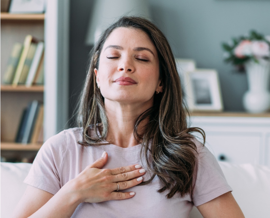 Woman practicing relaxation and wellness at pain management clinic Oakville